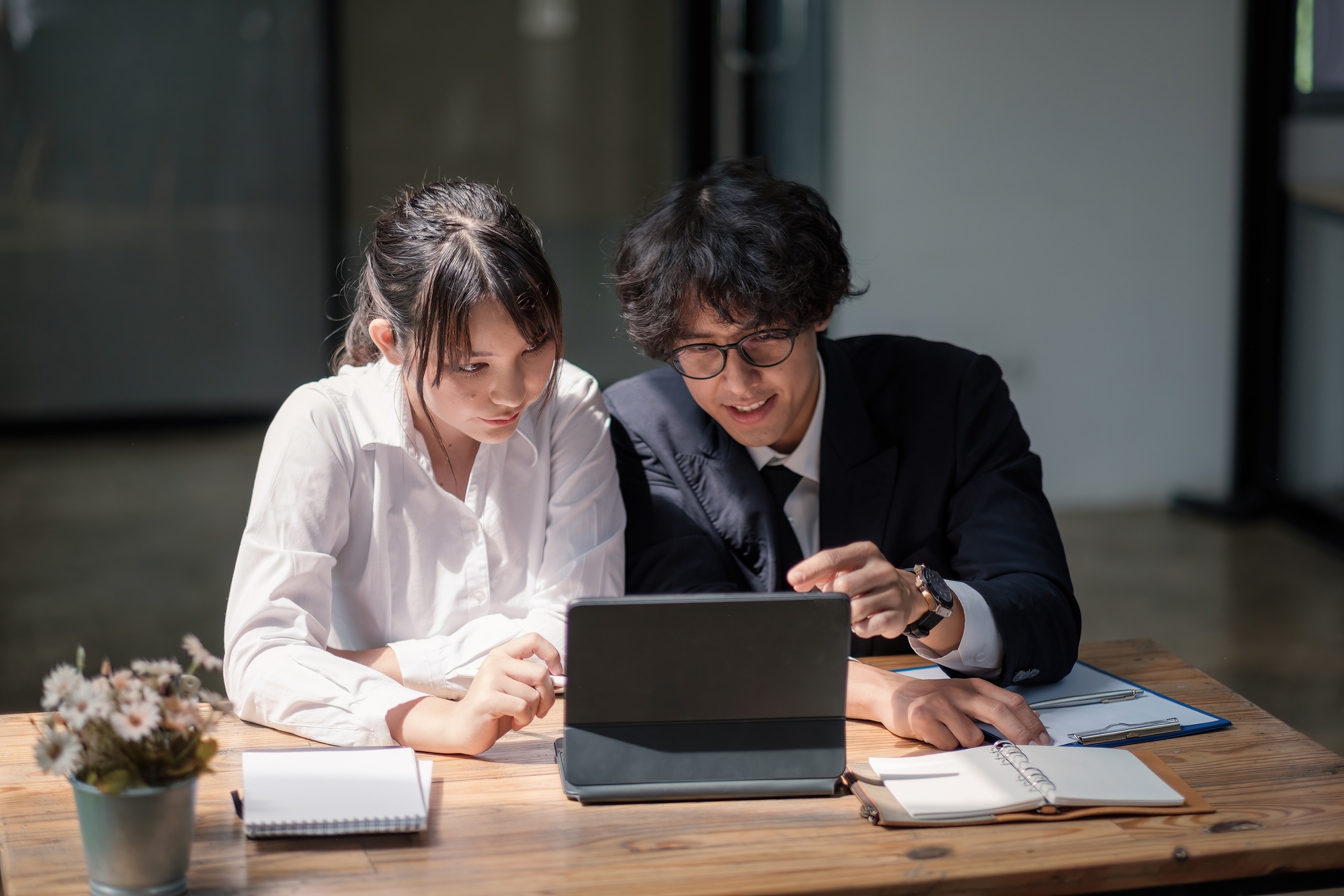 University asian students learning language using digital tablet and internet, working project
